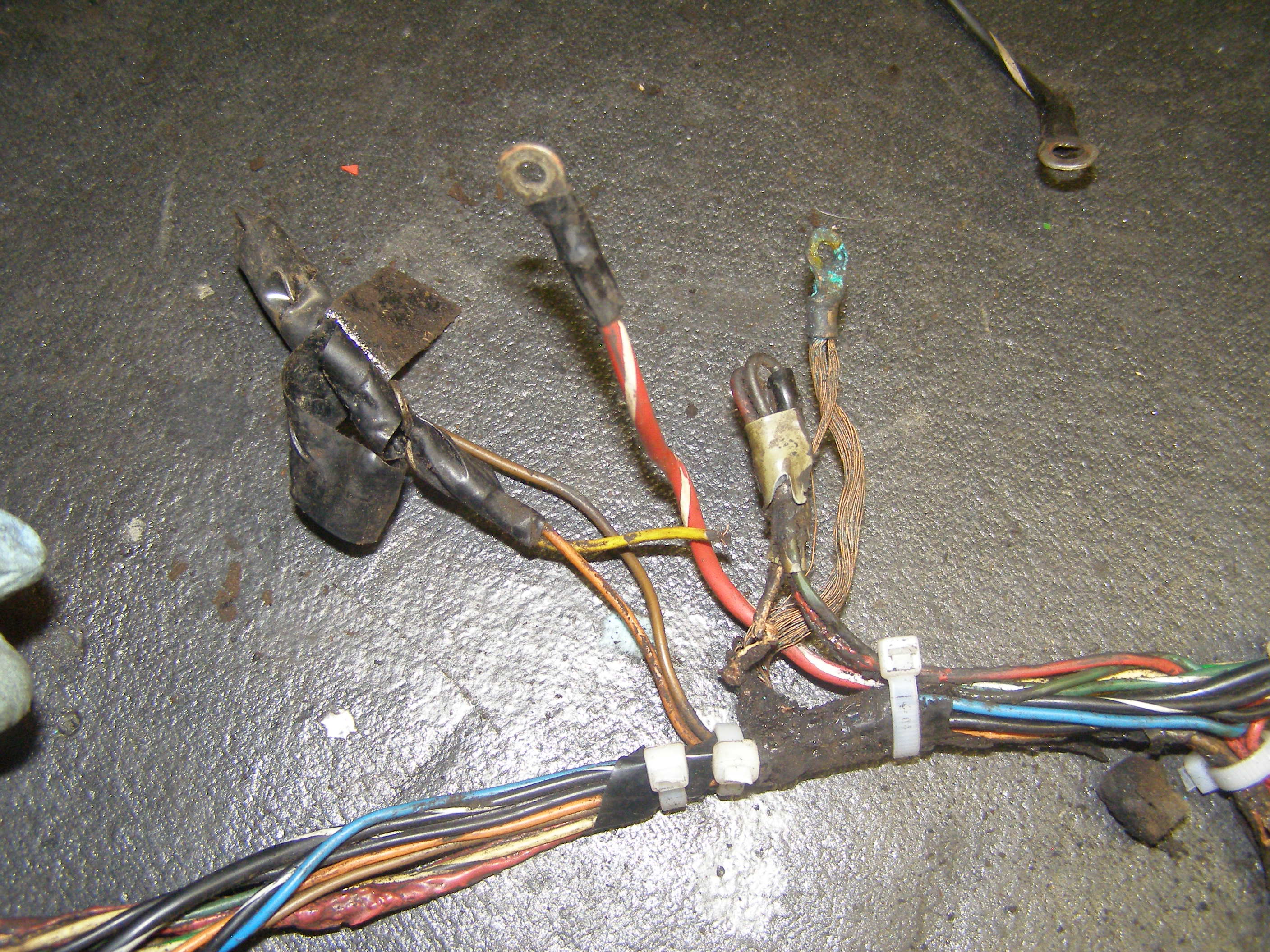 Wiring Harness With Burned Wires And Poor Repair Jobs